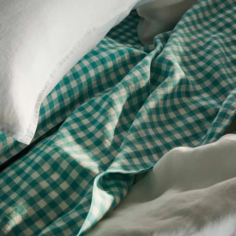 White, gray, and teal gingham linen sheets. 